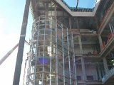Installing curtain wall mullions around the Monumental Stairs Facing West.jpg